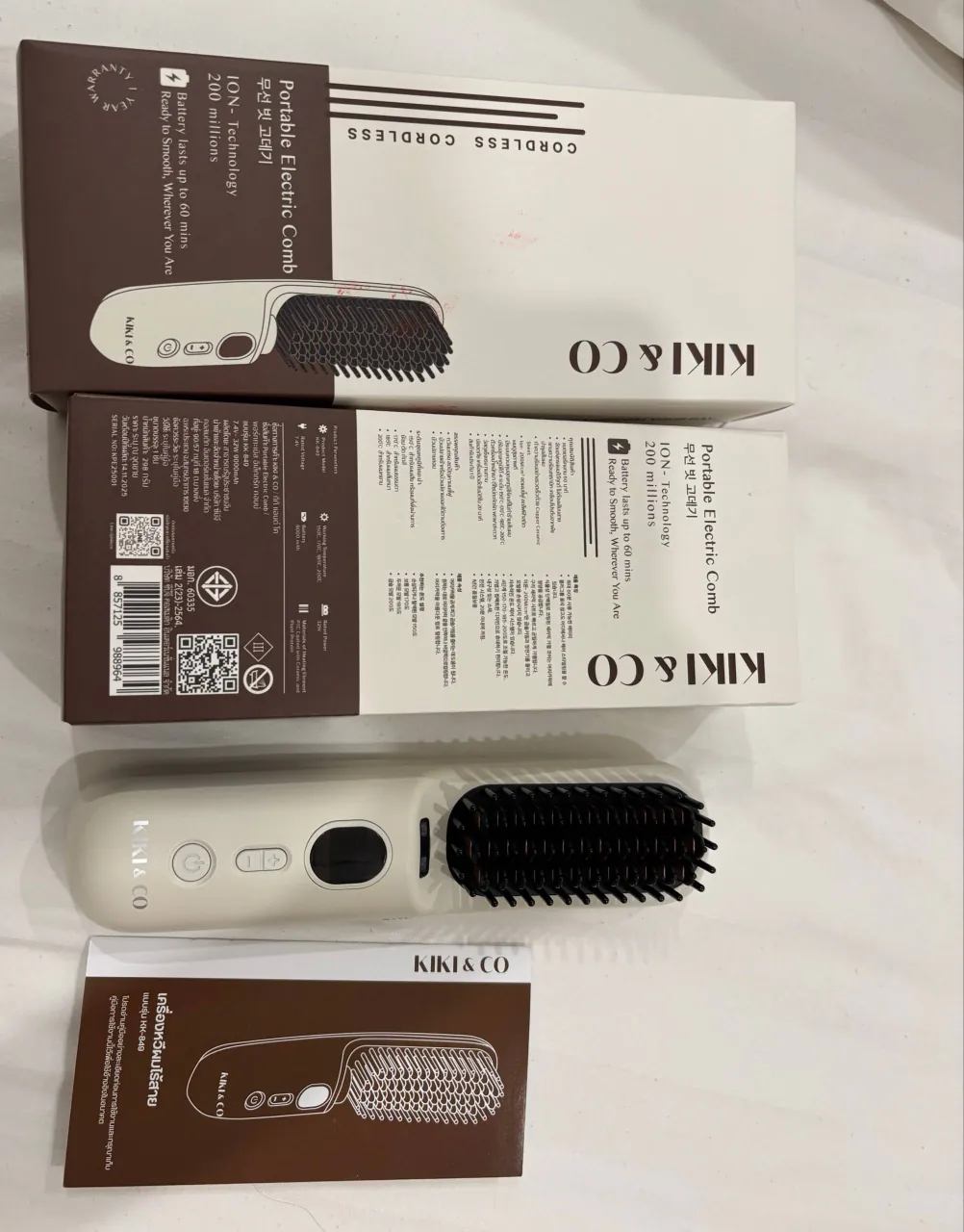 Portable hair styling comb
