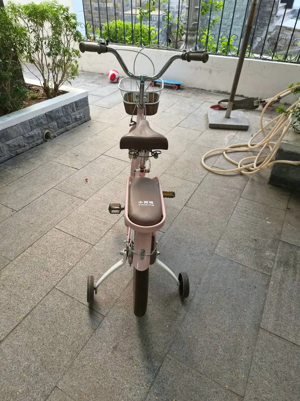 Kids’ bicycle with training wheels
