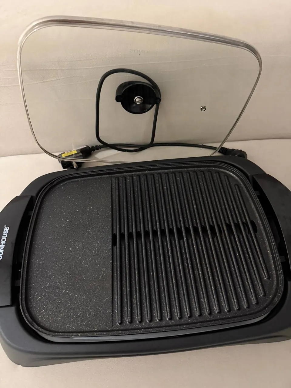 New electric grill in box
