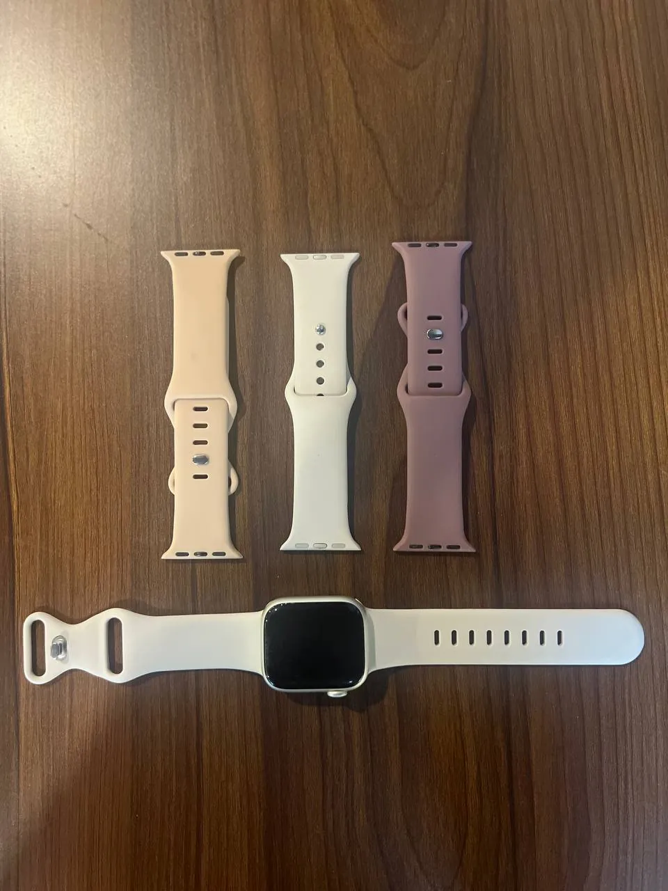 Apple Watch 7 with three bands
